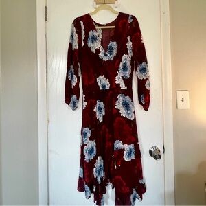 Red floral faux wrap dress with asymmetrical hem